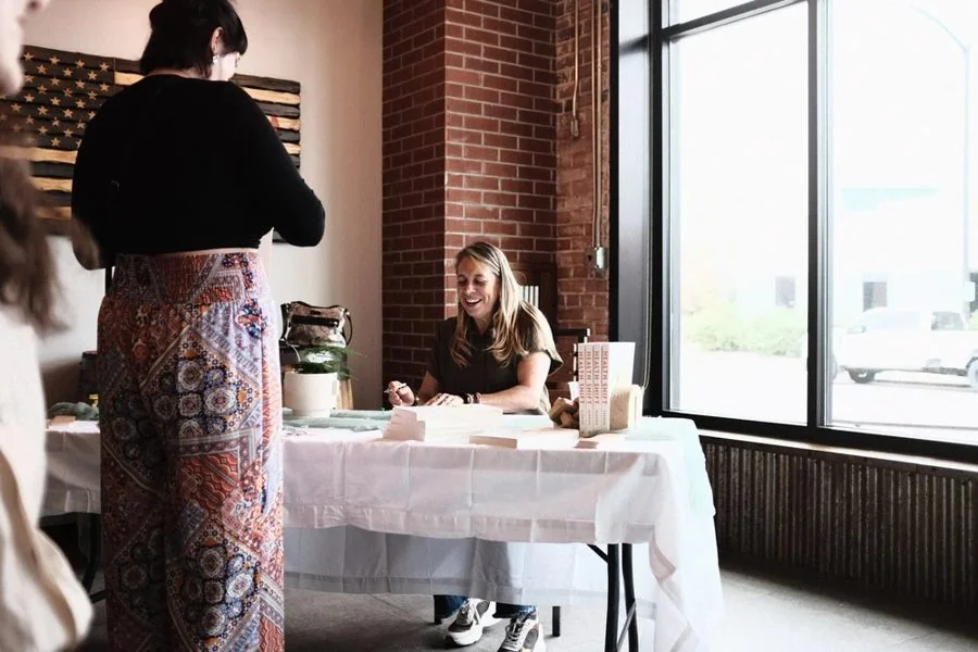 Dr. Alice Burron signing books